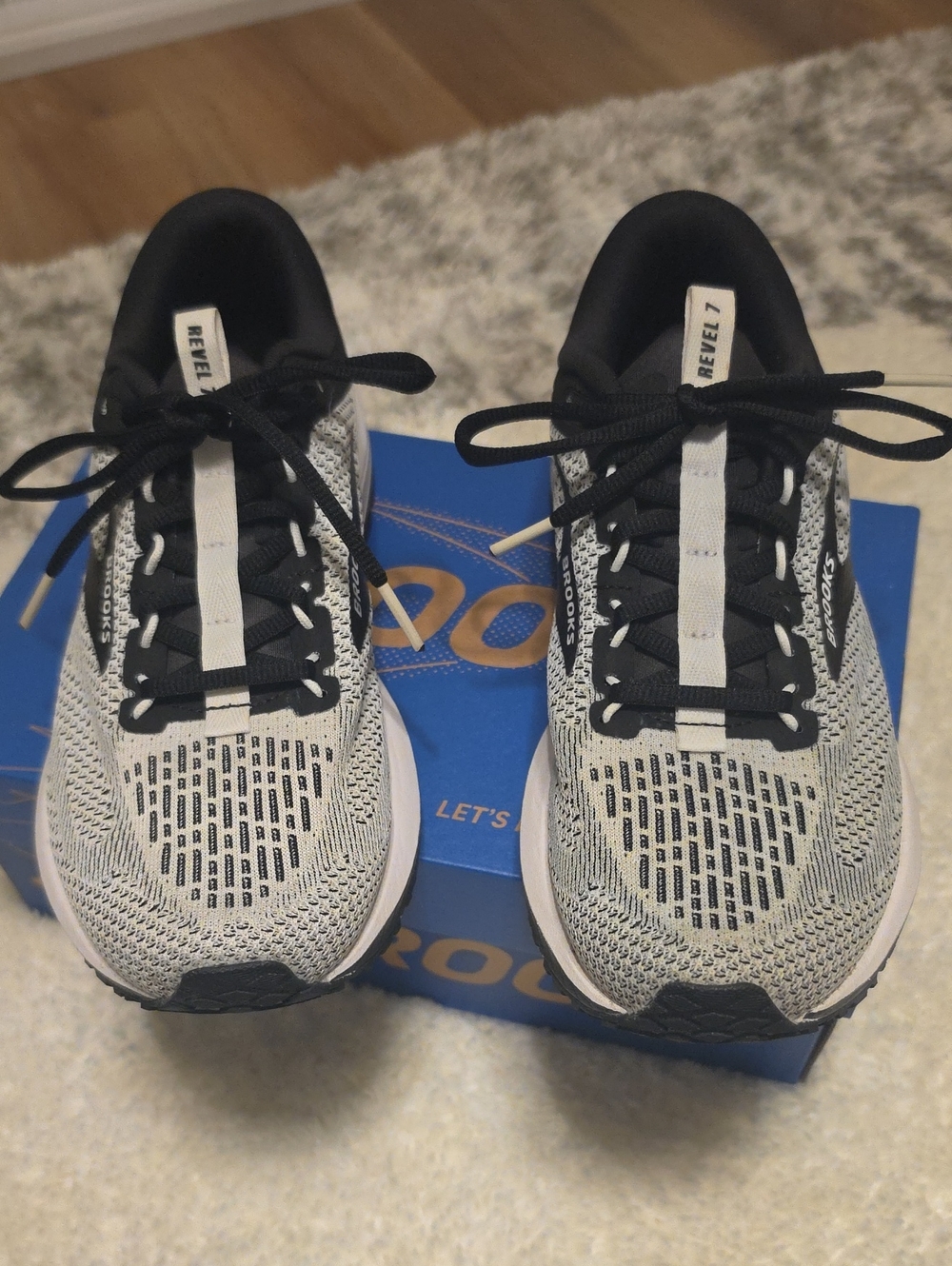 Brooks Women's Revel 7 Running Sneakers in Black and White
